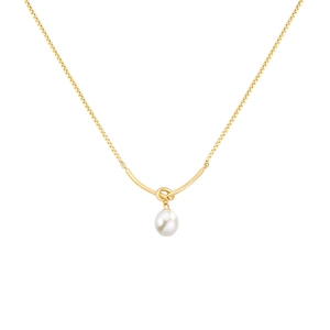 Macro detail of the elegant gold box chain and high-luster white pearl pendant