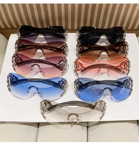Top view of Y2K rimless sunglasses collection in assorted lens colors and snake metal trim