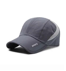 Detail view of dark grey mesh baseball cap with white SPORTS logo and breathable fabric