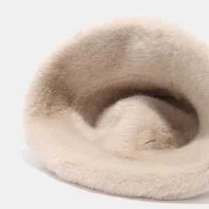 Thick plush beige faux fur bucket hat for women with soft texture for winter warmth