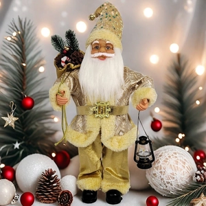 Detail of Santa Claus figure in gold sequins with gift bag and black vintage lantern