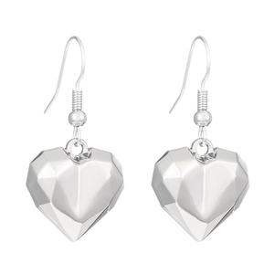 Detailed macro view of multifaceted silver heart earrings with fishhook wires
