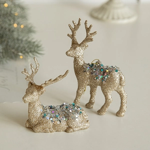 Glitzernde goldene Rentierfiguren mit Pailletten für die Weihnachtsdekoration