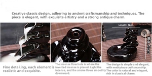 Macro detail of ceramic backflow incense burner showing dimensions 12cm by 9.5cm