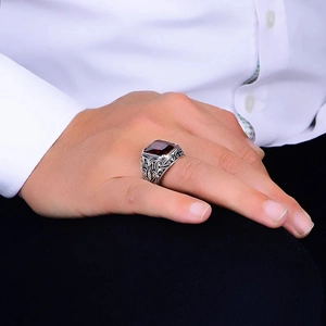 Vintage silver mens ring with intricate floral engraving and a large square red zircon stone