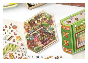 Detail of DIY scrapbook sticker set featuring a green cookbook storage box and kitchen scenes