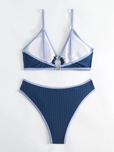 Blue ribbed two-piece bikini swimsuit with front ring detail and high-cut waist bottoms