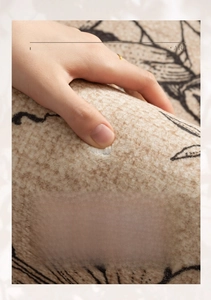 Close-up of high-density short pile carpet showing soft rebound texture and floral pattern
