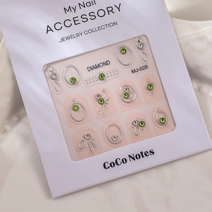 Sparkling green and silver nail art rhinestones set on MJ-028 series backing card