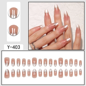 Cat-eye French press-on nails set with silver metallic edges and nude base finish