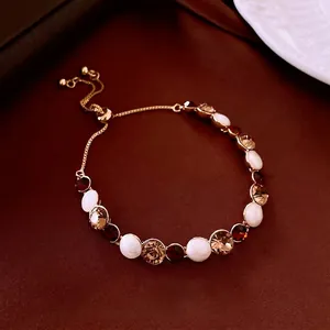 Vintage gold-plated adjustable bracelet with cat eye stone and faceted crystals