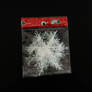 White snowflake Christmas tree hanging decoration with textured glitter finish