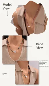 Detail of baroque pearl necklace with colorful beads on 18k gold plated chain
