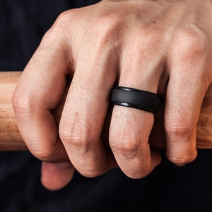 Classic matte black silicone ring for men shown on hand for outdoor sports and gym use