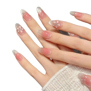 Pink gradient almond press-on nails with 3D resin flowers and sparkling rhinestones