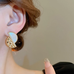 Elegant semi-circle fan stud earrings with mother-of-pearl and gold quilted texture
