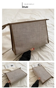 Détails du sac professionnel en toile kaki avec bordures en cuir marron