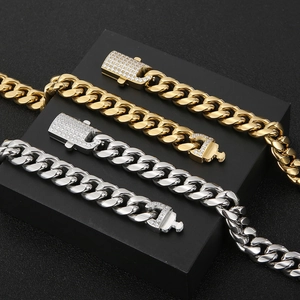 Men's hip hop Cuban link bracelet set in gold and silver with diamond-set clasps