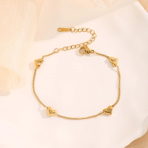 Golden heart bracelet with zircon stones on silk fabric, elegant stainless steel jewelry