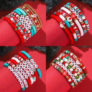 Christmas Heishi bead bracelet set with red green clay discs and festive charms