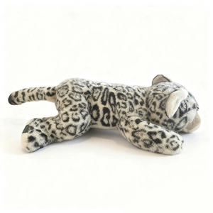 Adorable plush snow leopard toy in lying position with realistic gray leopard print