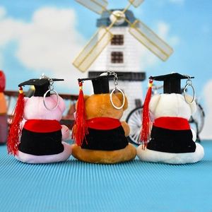 Set di tre portachiavi a forma di orsetto di laurea in rosa, marrone e bianco
