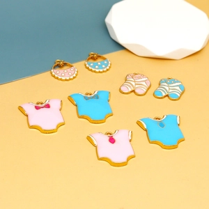 Set of 8 enamel baby-themed charms featuring cute bodysuits, socks, and bibs in pink and blue