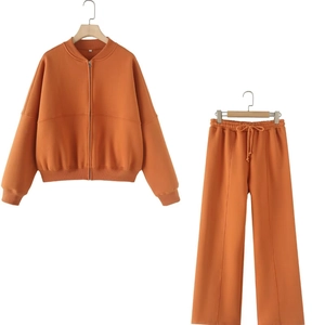 Orange two-piece casual set featuring a zipper bomber jacket and high-waist wide-leg pants