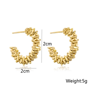 Golden C-shaped textured hoop earrings with a 2cm diameter and 5g weight design