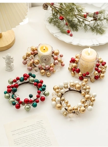 Detail view of 13cm Christmas berry candle rings with glitter beads and festive decor