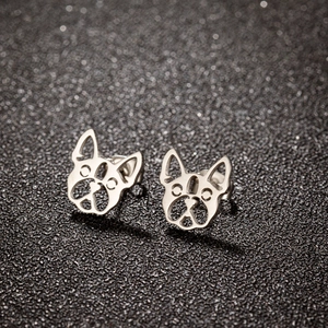 Close-up of French Bulldog stud earrings in polished silver stainless steel finish