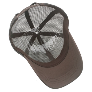 Detail view of brown mesh trucker hat interior showing breathable 6-panel structure