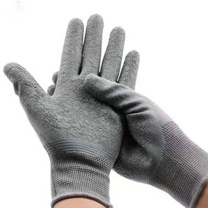 Gray industrial safety gloves with textured latex palm coating and knitted wrist