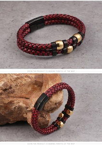 Detail of red and black woven leather bracelet with gold beads and magnetic clasp