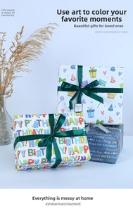 Detailed view of birthday gift boxes wrapped in colorful patterns and dark green ribbons