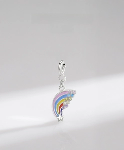 Detail view of s925 silver rainbow shooting star pendant with micro-set colorful zircons