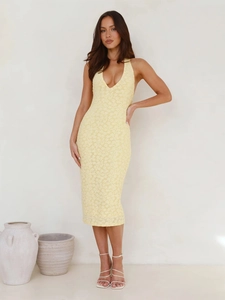 Elegant pale yellow halter-neck V-neck midi dress with floral texture and backless style