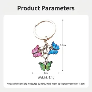 Colorful butterfly keychain pendant with pink blue and green enamel metal finish