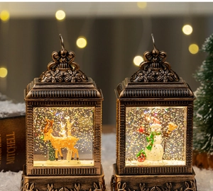 Detail of retro bronze Christmas lanterns with warm lights and floating gold glitter inside