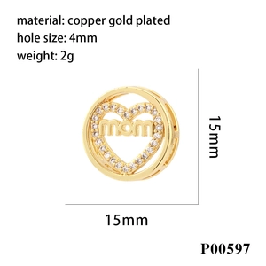 Detail of MOM heart pendant with white cubic zirconia and gold plated copper specs