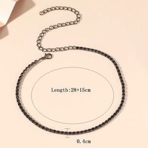 Detailed view of black rhinestone choker with lobster clasp and adjustable chain length