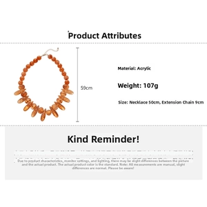 Detail view of acrylic orange beaded necklace with 59cm length and 107g weight specs