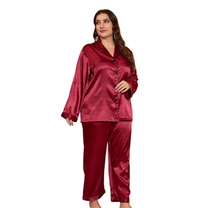 Women's plus size burgundy silk satin pajama set with long sleeves and black piping detail