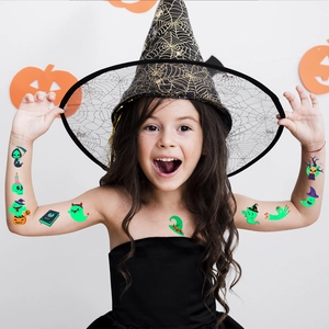 Luminous Halloween temporary tattoos for kids featuring ghost and pumpkin designs