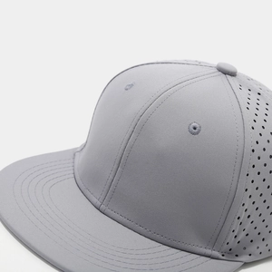 Close-up of grey quick-dry baseball cap with laser-cut ventilation holes and flat brim