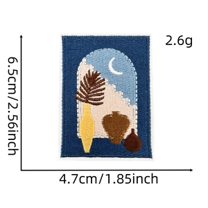 Detail of bohemian iron-on patch showing embroidered moon and plants 6.5cm x 4.7cm