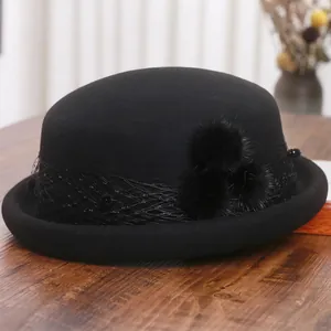 French vintage black wool cloche hat with mesh veil and plush balls for autumn and winter