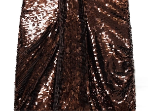 Macro shot of shimmering brown sequins on a stylish mini dress showing fine craftsmanship