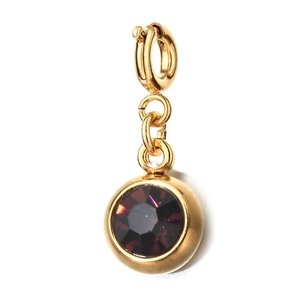 Close-up of a 6mm gold stainless steel charm with a round dark red birthstone inlay