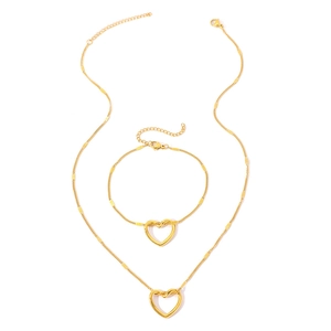 Polished gold stainless steel jewelry set featuring hollow heart pendants and lobster clasps